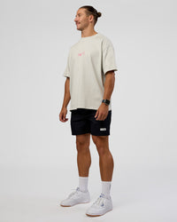 Man wearing Trust The Process Heavyweight Unisex Oversized Tee - Digital Mist-Ultra Pink | Model:Jaiden | Size:M | Thumbnail Index: 5