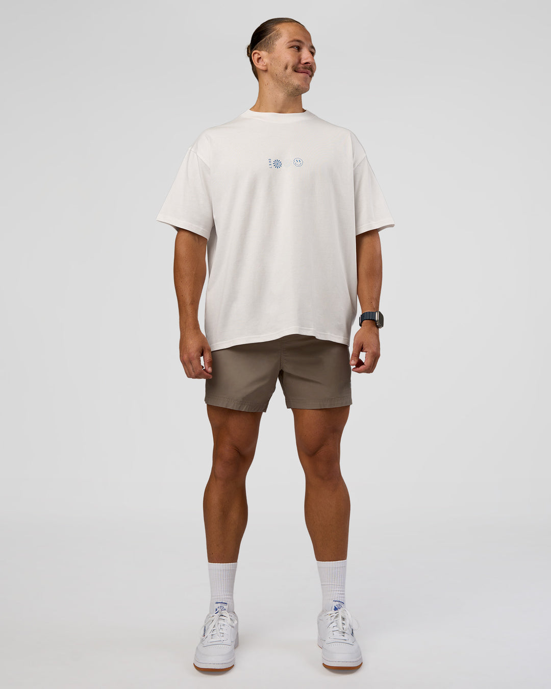 Man wearing Trust The Process Heavyweight Unisex Oversized Tee - Off White-Electric Indigo | Model:Jaiden | Size:M - view 6