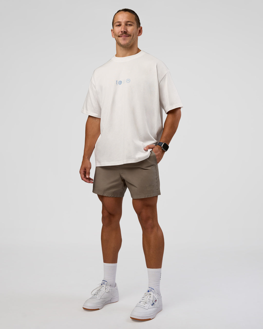 Man wearing Trust The Process Heavyweight Unisex Oversized Tee - Off White-Electric Indigo | Model:Jaiden | Size:M - view 8