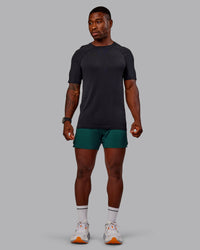 Man wearing UltraAir 5" Lined Performance Short in Dark Moss | Size:M | Thumbnail Index: 1