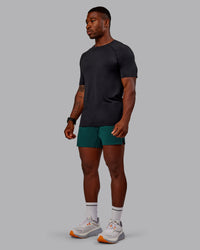Man wearing UltraAir 5" Lined Performance Short in Dark Moss | Size:M | Thumbnail Index: 3