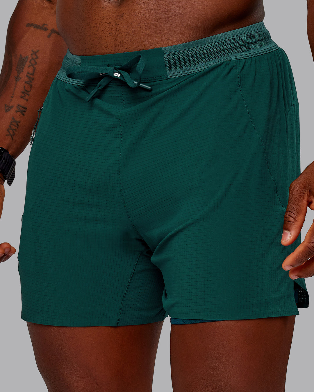 Man wearing UltraAir 5" Lined Performance Short in Dark Moss | Size:M - view 1