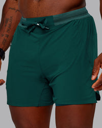 Man wearing UltraAir 5" Lined Performance Short in Dark Moss | Size:M | Thumbnail Index: 0