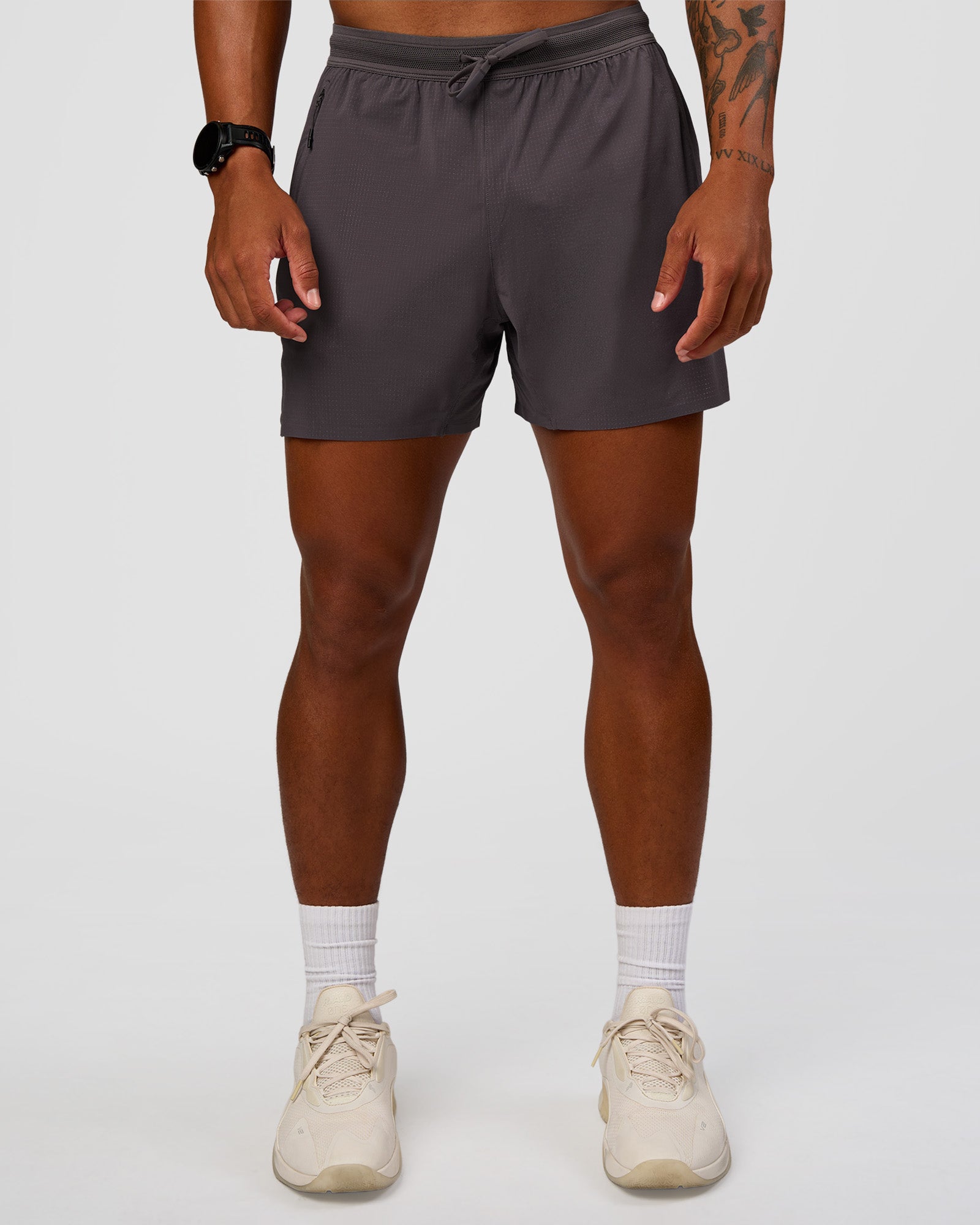 Man wearing UltraAir 5" Lined Performance Short - Duskstone | Model:Malebo | Size:M