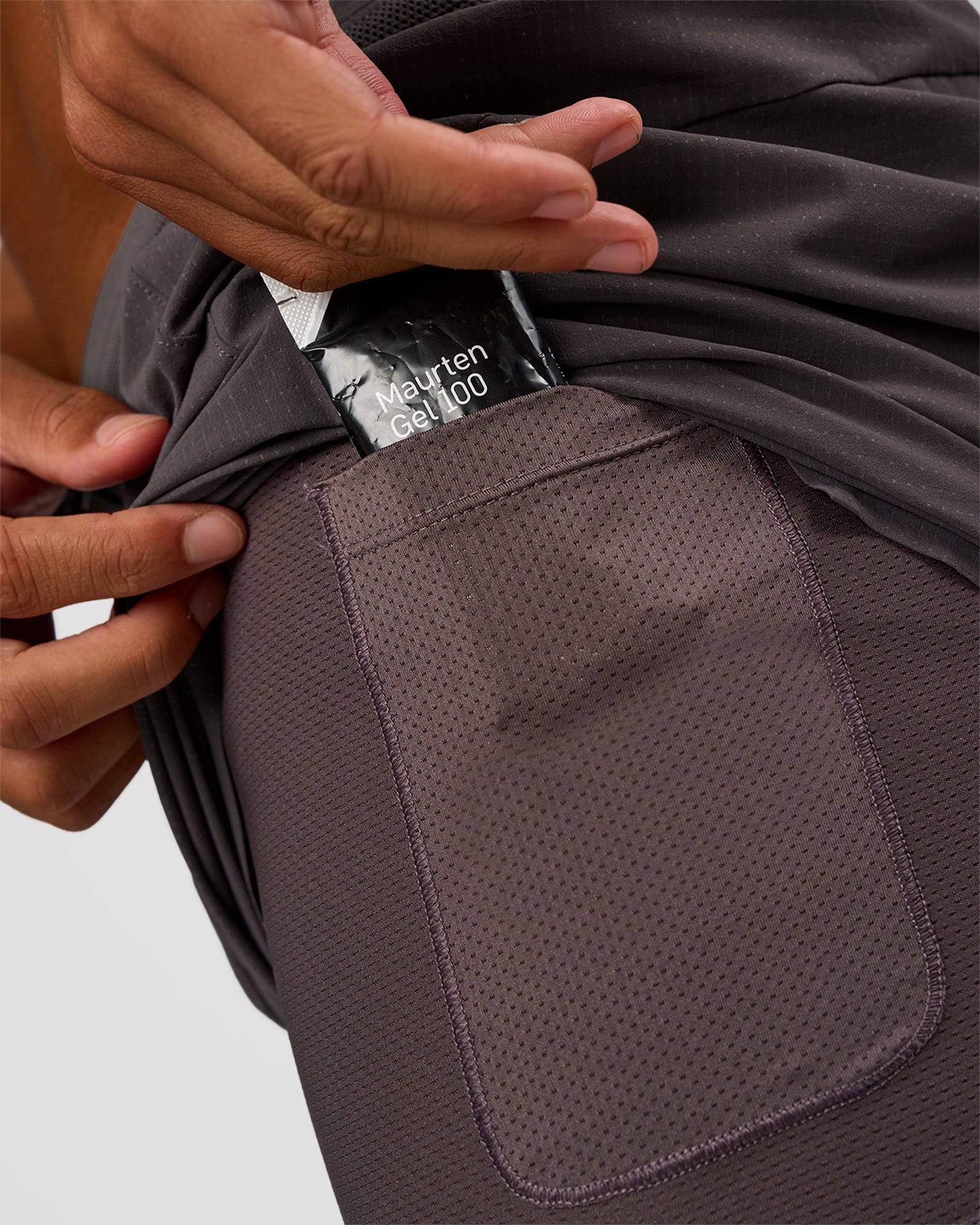 Man wearing UltraAir 5" Lined Performance Short - Duskstone | Model:Malebo | Size:M