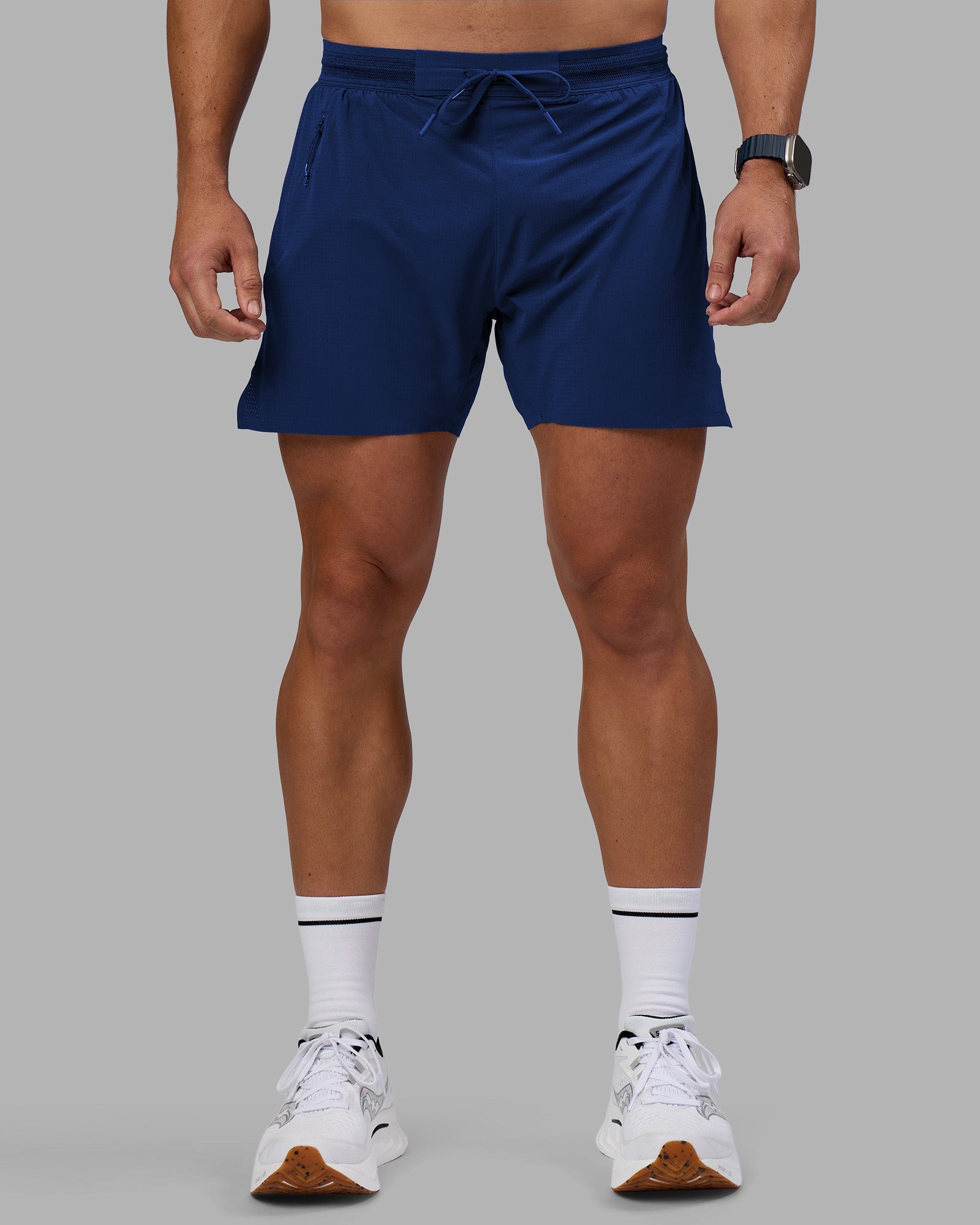 Man wearing UltraAir 5" Lined Performance Short - Midnight Blue | Model:Jaiden | Size:M