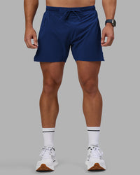 Man wearing UltraAir 5" Lined Performance Short - Midnight Blue | Model:Jaiden | Size:M | Thumbnail Index: 0
