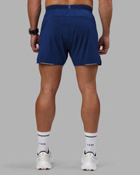 Man wearing UltraAir 5" Lined Performance Short - Midnight Blue | Model:Jaiden | Size:M | Thumbnail Index: 2