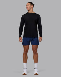 Man wearing UltraAir 5" Lined Performance Short - Midnight Blue | Model:Jaiden | Size:M | Thumbnail Index: 4