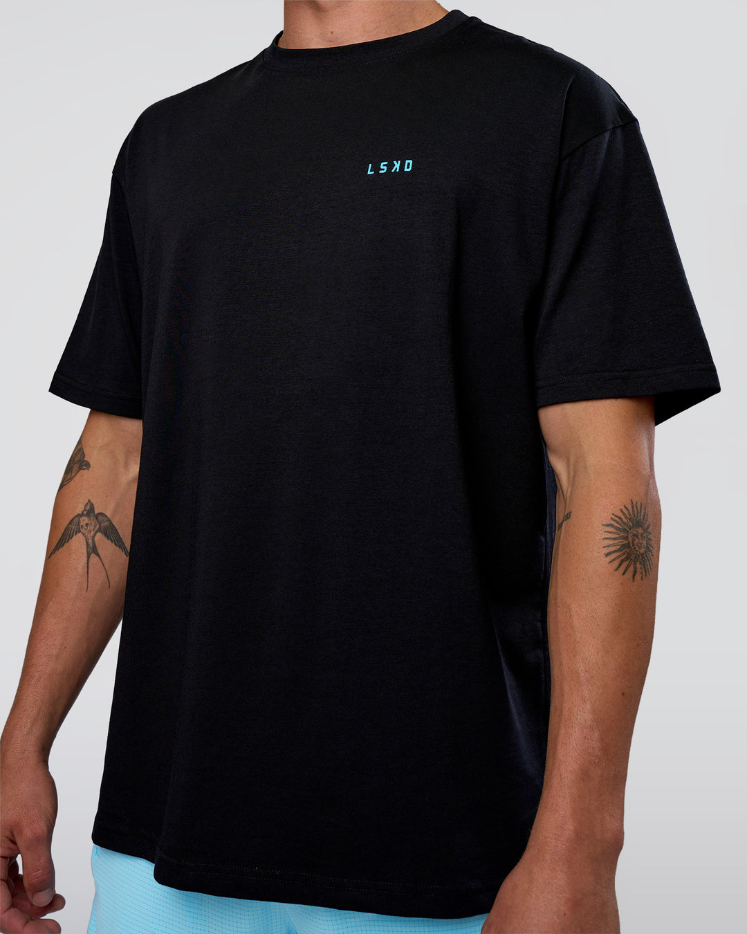 Man wearing Unfit Club FLXCotton Oversized Tee - Black-White | Model:Konnor | Size:M - view 8
