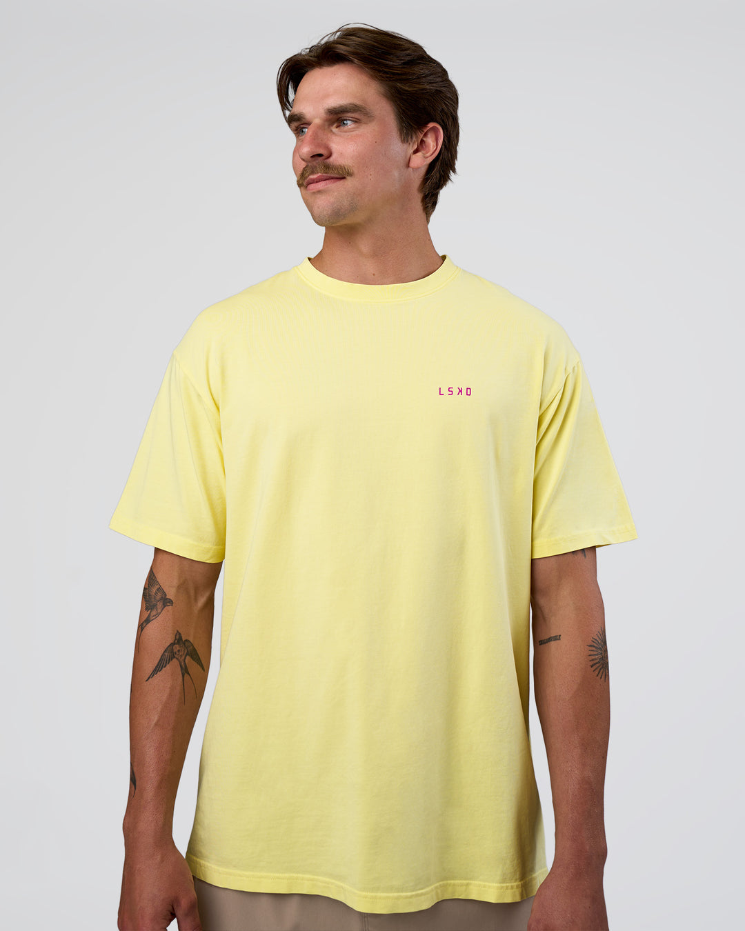 Man wearing Unfit Club FLXCotton Oversized Tee - Yellow Fizz Washed-Ultra Fuchsia | Model:Konnor | Size:M - view 5