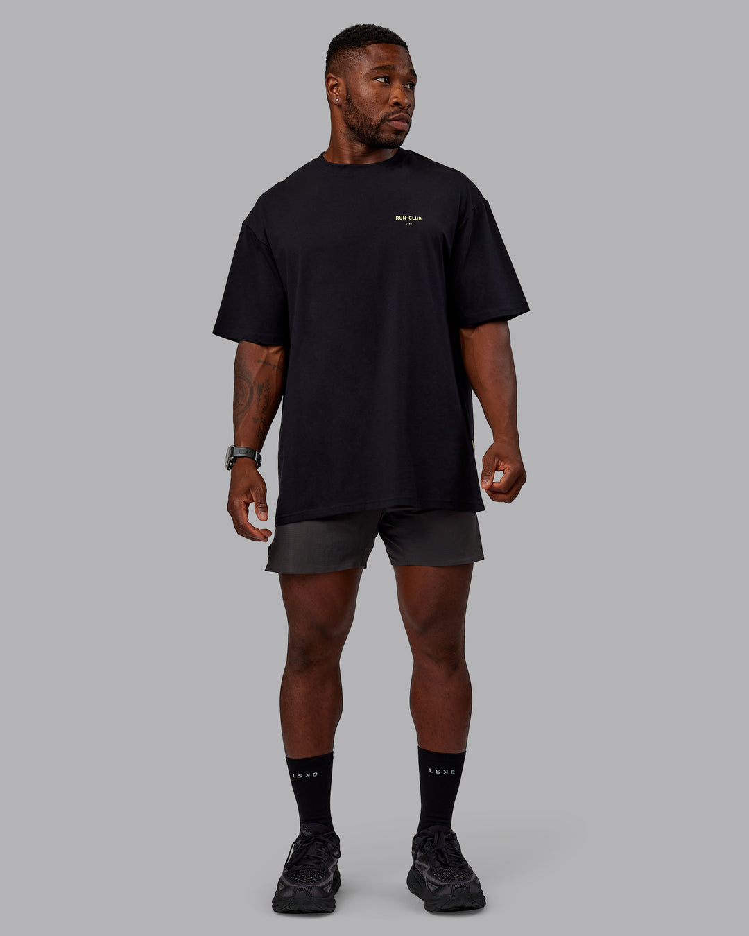 Man wearing Unisex RUN CLUB FLXCotton Tee Oversize - Black-Vol - view 9