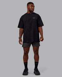 Man wearing Unisex RUN CLUB FLXCotton Tee Oversize - Black-Vol | Thumbnail Index: 8