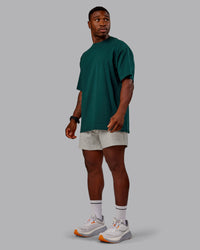Man wearing Variation FLXCotton Oversized Tee in Dark Moss-Digital Mist | Size:M | Thumbnail Index: 5