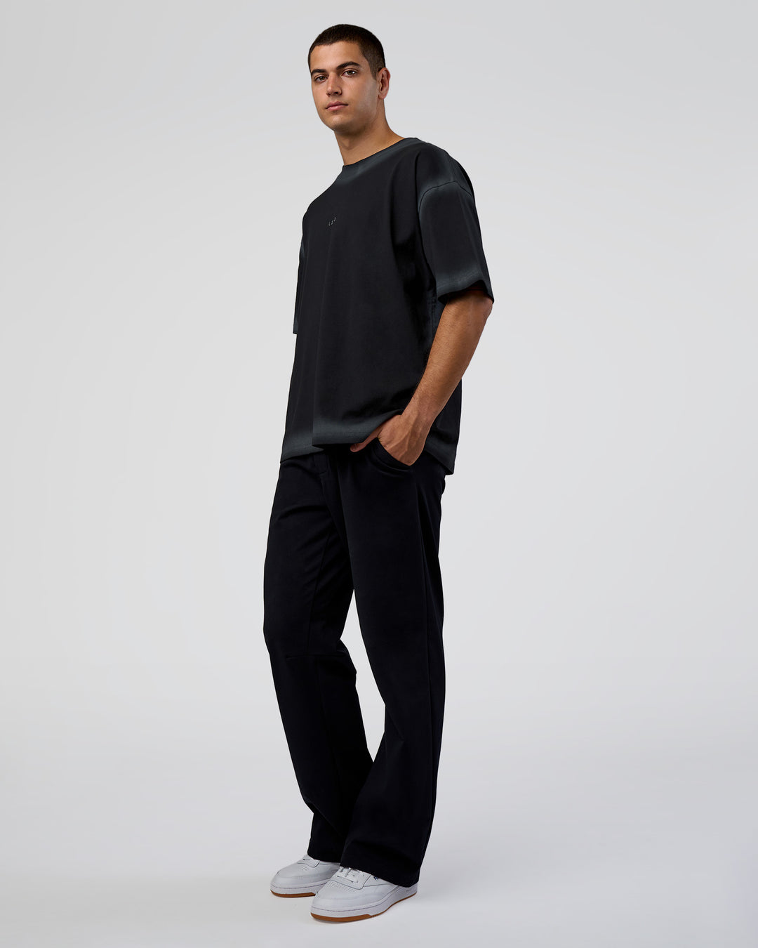 Man wearing Urban Blur Heavyweight Unisex Oversized Tee - Black-Dark Storm | Model:Zoran | Size:M - view 2