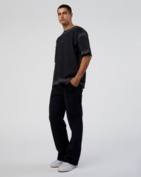 Man wearing Urban Blur Heavyweight Unisex Oversized Tee - Black-Dark Storm | Model:Zoran | Size:M | Thumbnail Index: 1