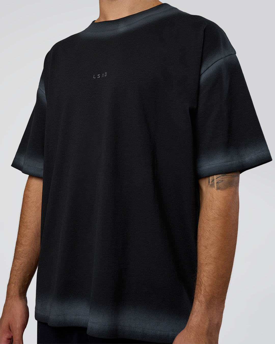 Man wearing Urban Blur Heavyweight Unisex Oversized Tee - Black-Dark Storm | Model:Zoran | Size:M - view 9