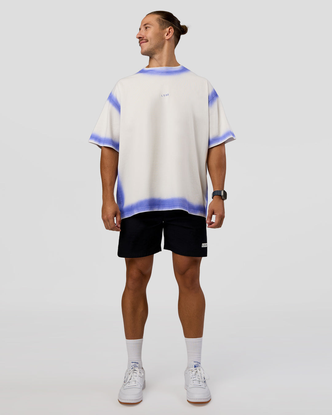 Man wearing Urban Blur Heavyweight Unisex Oversized Tee - Off White-Power Cobalt | Model:Jaiden | Size:M - view 10