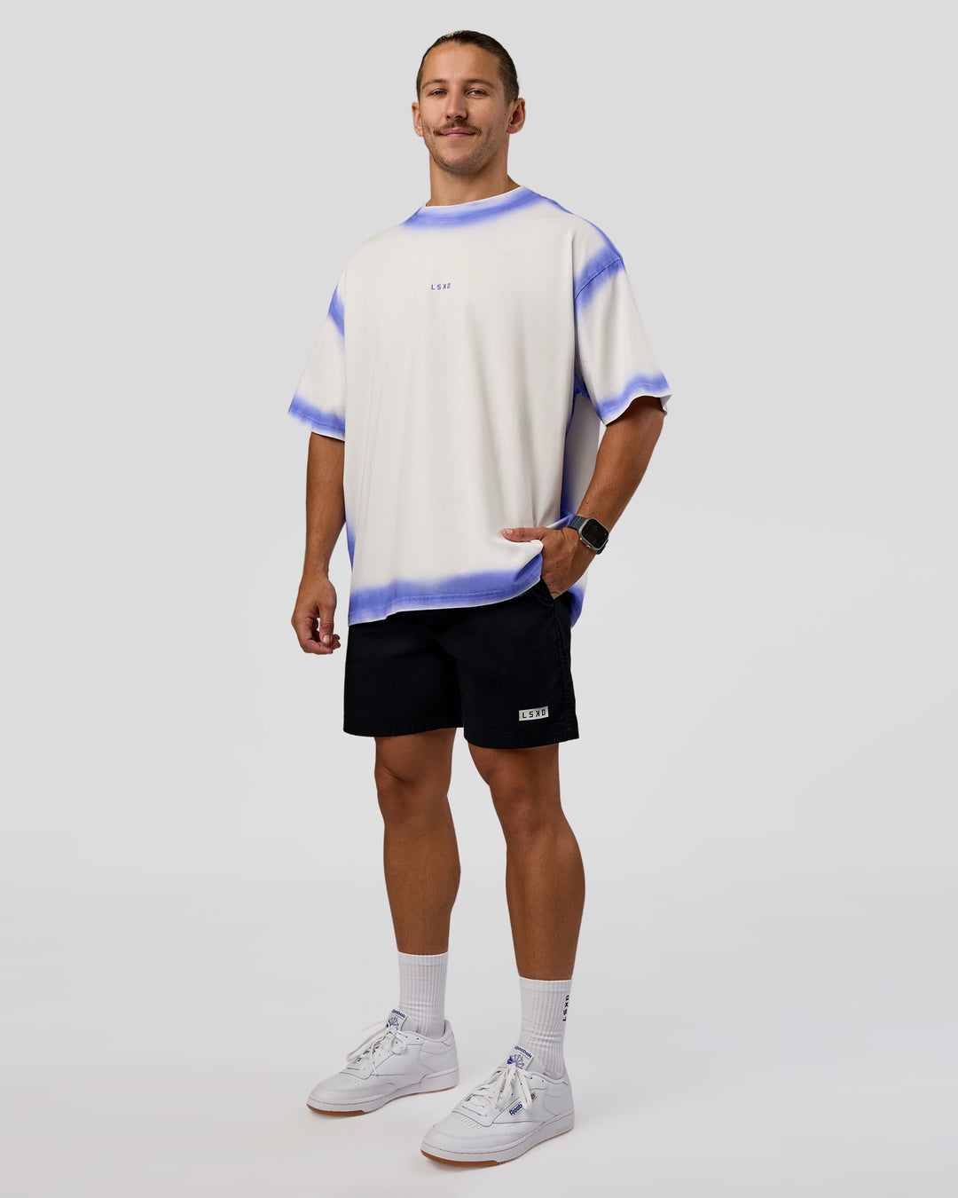 Man wearing Urban Blur Heavyweight Unisex Oversized Tee - Off White-Power Cobalt | Model:Jaiden | Size:M - view 3
