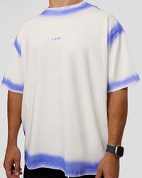 Man wearing Urban Blur Heavyweight Unisex Oversized Tee - Off White-Power Cobalt | Model:Jaiden | Size:M | Thumbnail Index: 6