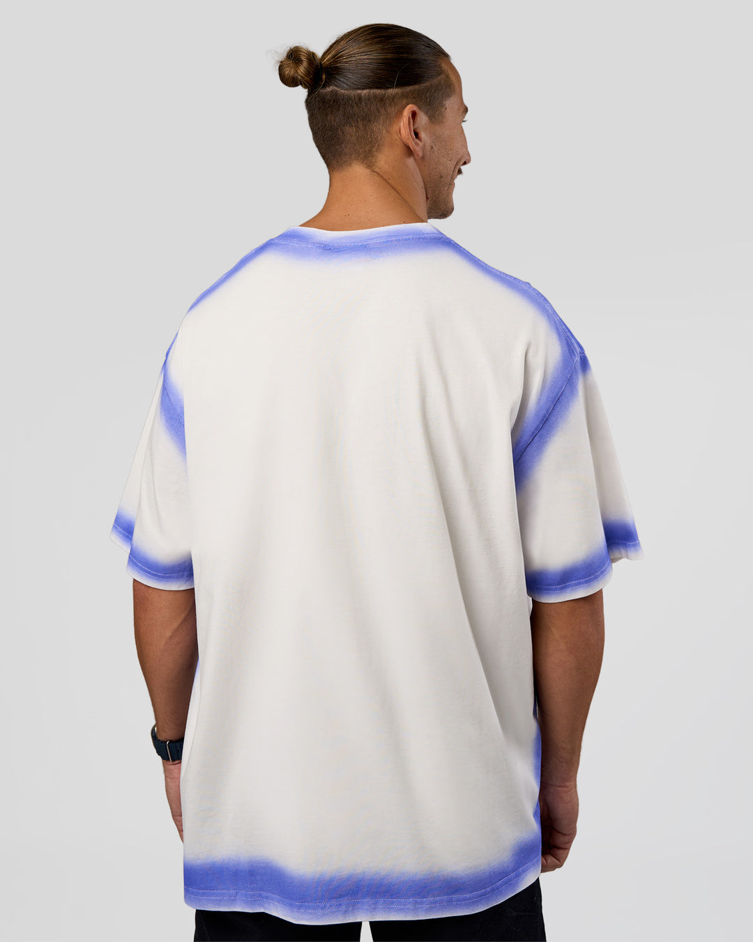 Man wearing Urban Blur Heavyweight Unisex Oversized Tee - Off White-Power Cobalt | Model:Jaiden | Size:M - view 6