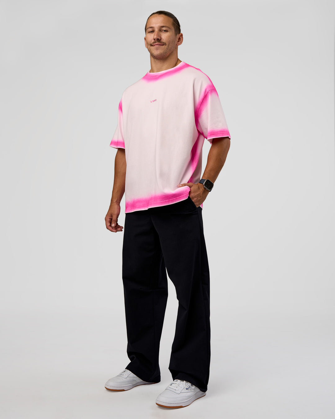 Man wearing Urban Blur Heavyweight Unisex Oversized Tee - Off White-Ultra Pink | Model:Jaiden | Size:M - view 3