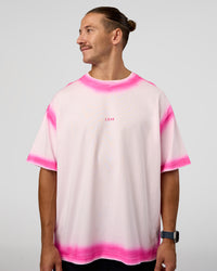 Man wearing Urban Blur Heavyweight Unisex Oversized Tee - Off White-Ultra Pink | Model:Jaiden | Size:M | Thumbnail Index: 10
