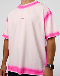 Man wearing Urban Blur Heavyweight Unisex Oversized Tee - Off White-Ultra Pink | Model:Jaiden | Size:M | Thumbnail Index: 6