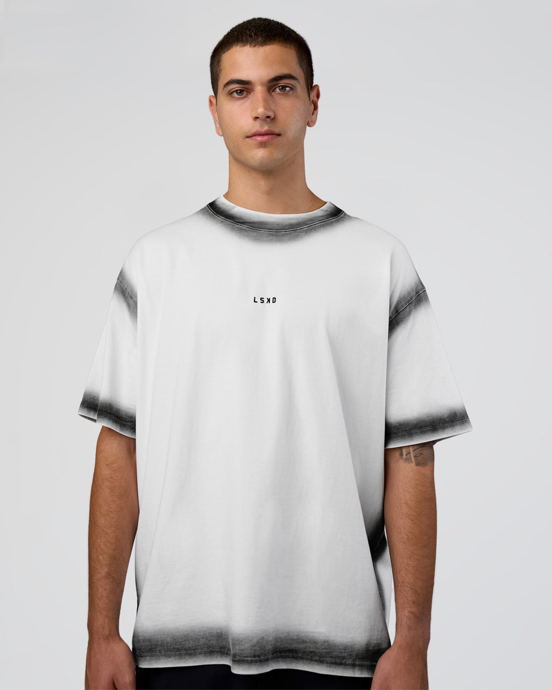 Man wearing Urban Blur Heavyweight Unisex Oversized Tee - White-Black | Model:Zoran | Size:M - view 2