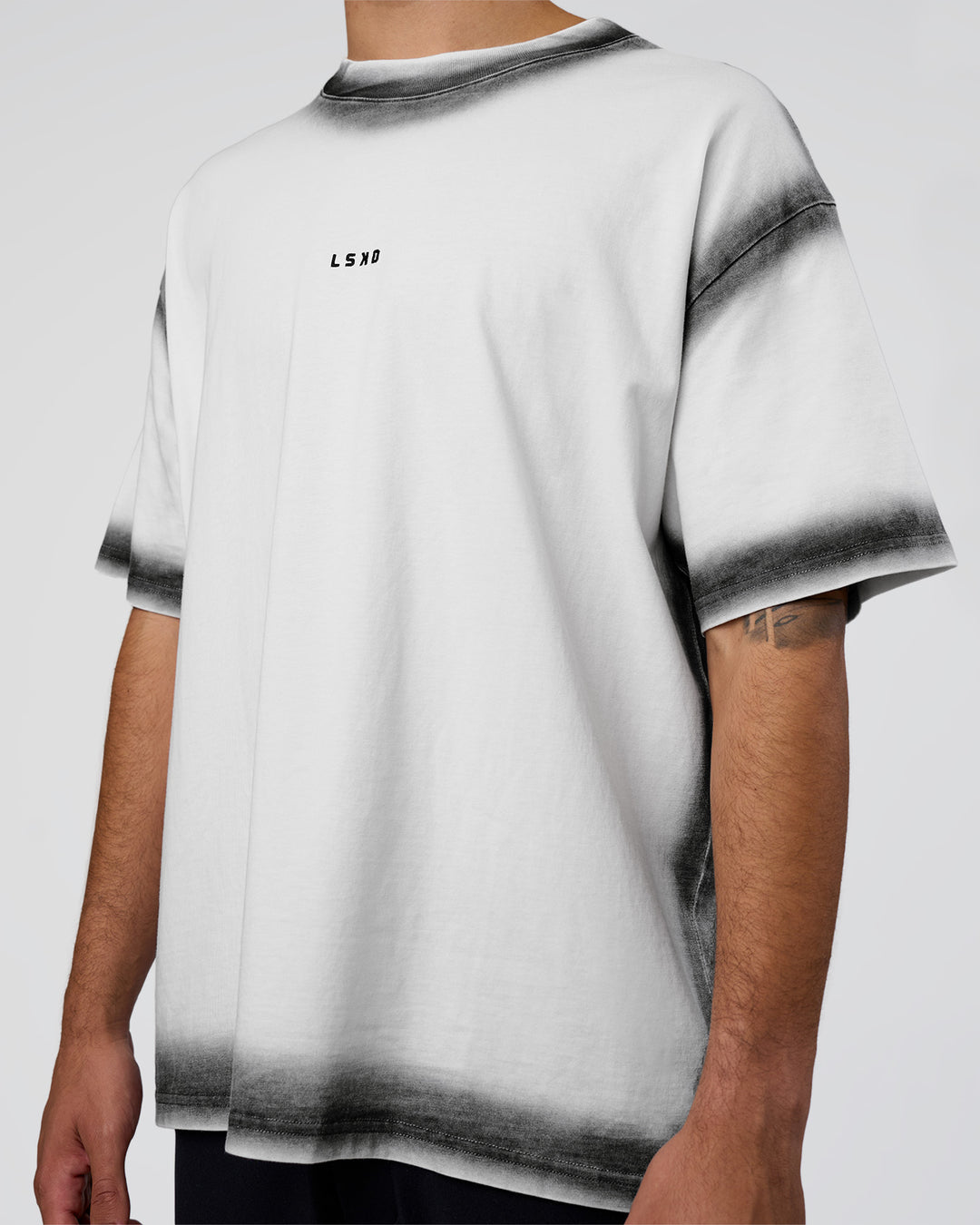 Man wearing Urban Blur Heavyweight Unisex Oversized Tee - White-Black | Model:Zoran | Size:M - view 8