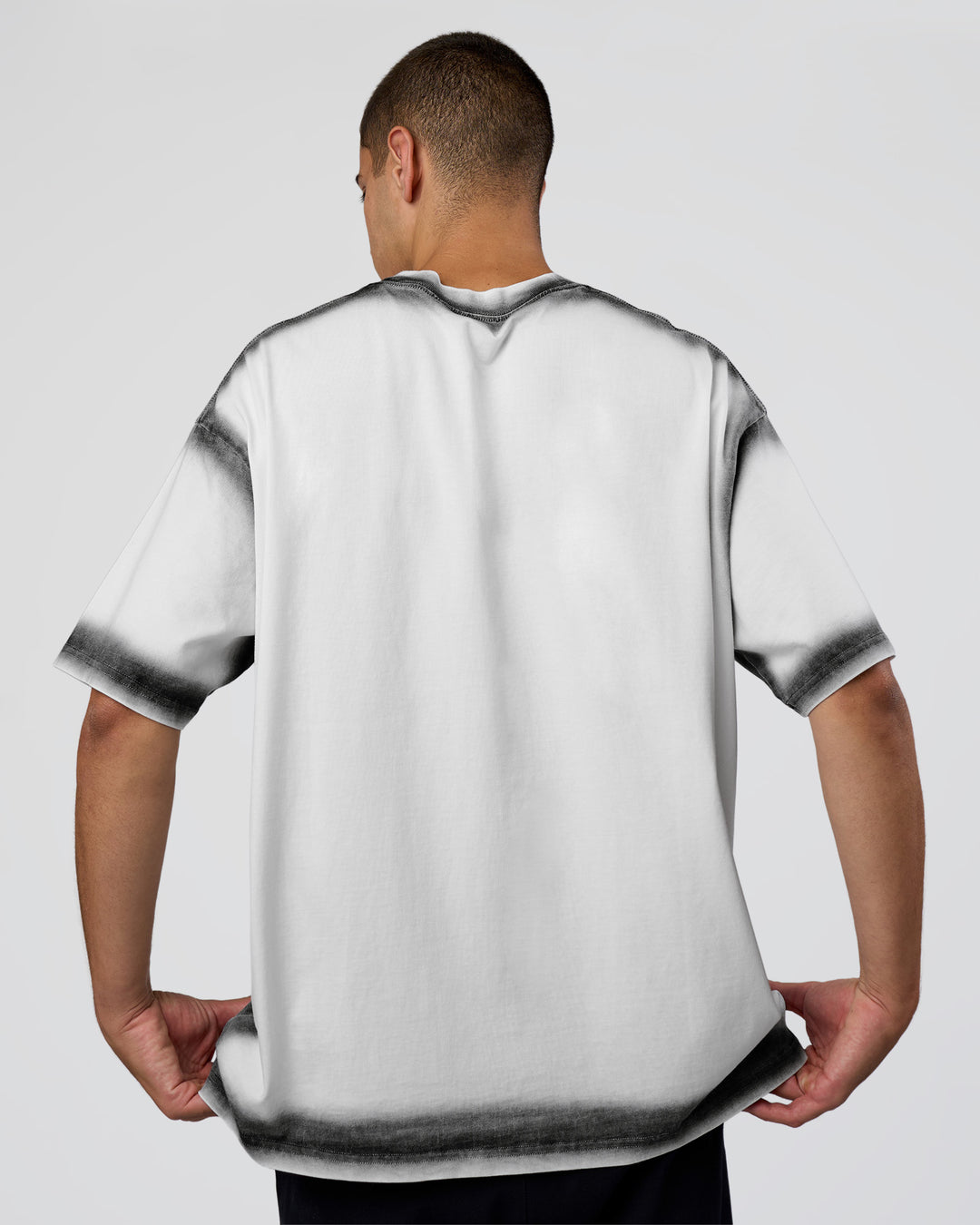 Man wearing Urban Blur Heavyweight Unisex Oversized Tee - White-Black | Model:Zoran | Size:M - view 3
