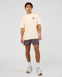 Man wearing Values Run Club FLXCotton Tee - Off White-Candy Pink | Model:Leandro | Size:M | Thumbnail Index: 7