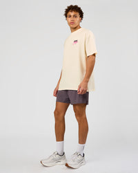 Man wearing Values Run Club FLXCotton Tee - Off White-Candy Pink | Model:Leandro | Size:M | Thumbnail Index: 5