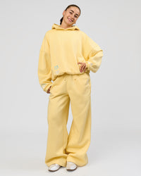 Woman wearing Zola Oversized Hoodie - Lemon | Model:Grace | Size:M | Thumbnail Index: 8