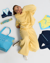 Woman wearing Zola Oversized Hoodie - Lemon | Model:Grace | Size:M | Thumbnail Index: 13