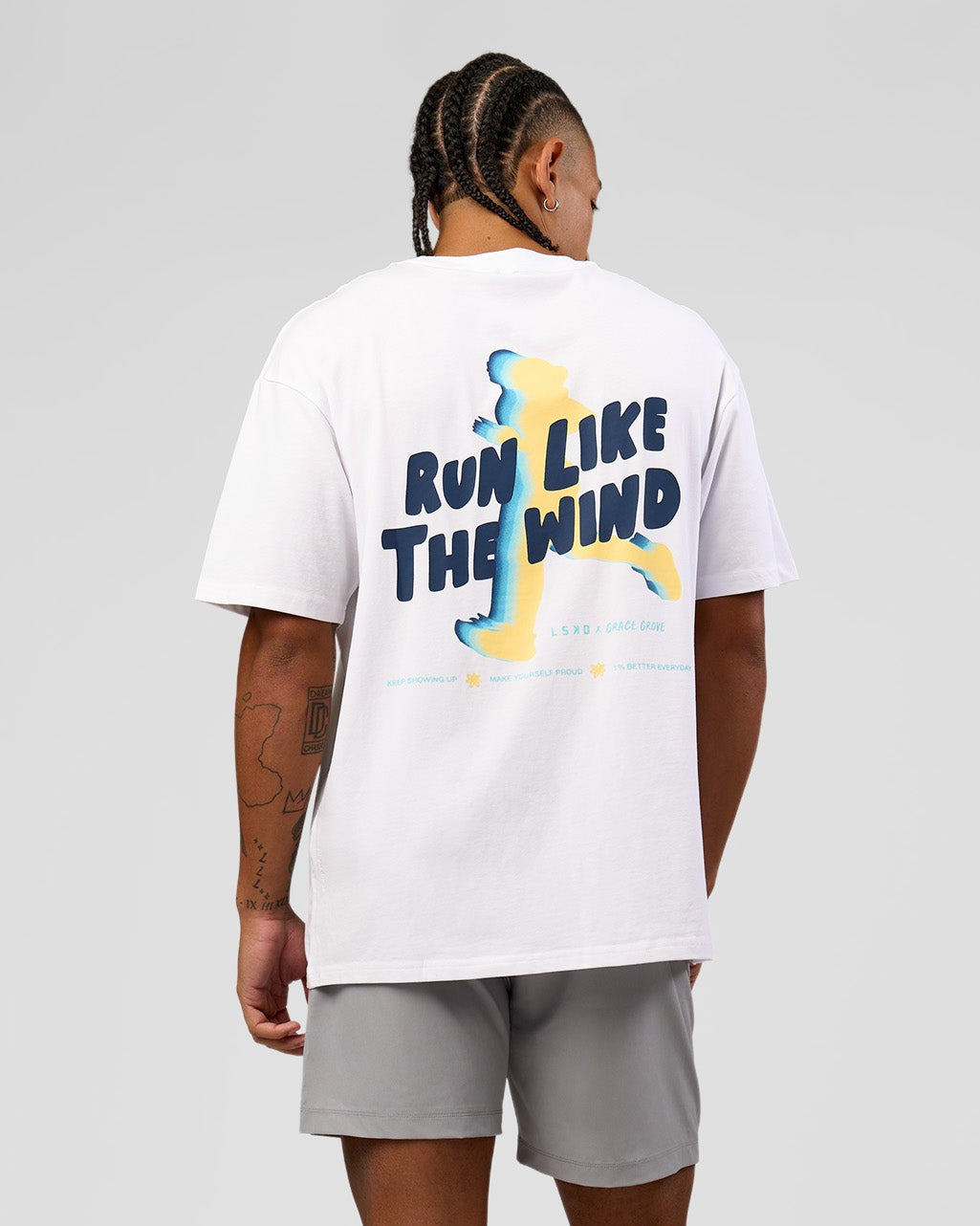 Man wearing Run Like The Wind FLXCotton Oversized Tee - White-Future Navy | Model:Malebo | Size:M - view 3