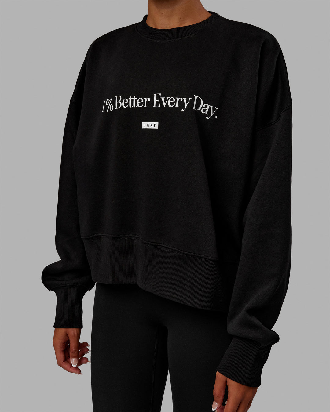Woman wearing 1% Better Heavyweight Sweater - Black-White - view 3