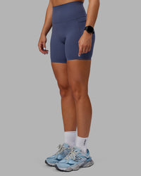 Woman wearing Abs Elixir Ultra High-Rise 6" Short Pockets - Nightshadow Blue | Thumbnail Index: 8