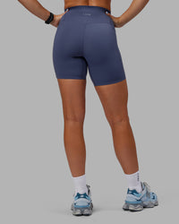 Woman wearing Abs Elixir Ultra High-Rise 6" Short Pockets - Nightshadow Blue | Thumbnail Index: 3