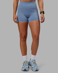 Woman wearing Abs Elixir Ultra High-Rise 4" Short Pockets - Infinity Mirage | Thumbnail Index: 0
