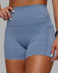 Woman wearing Abs Elixir Ultra High-Rise 4" Short Pockets - Infinity Mirage | Thumbnail Index: 6