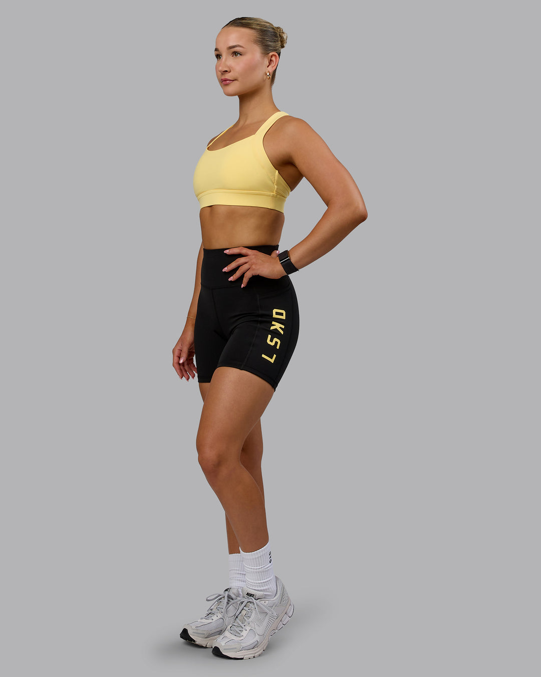 Woman wearing Advance Sports Bra - Lemon - view 6