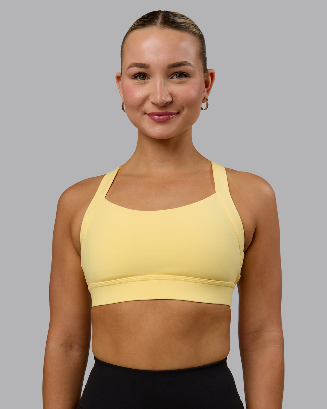 Woman wearing Advance Sports Bra - Lemon - view 1