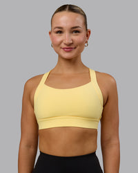 Woman wearing Advance Sports Bra - Lemon | Thumbnail Index: 0