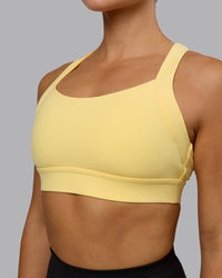 Woman wearing Advance Sports Bra - Lemon | Thumbnail Index: 6
