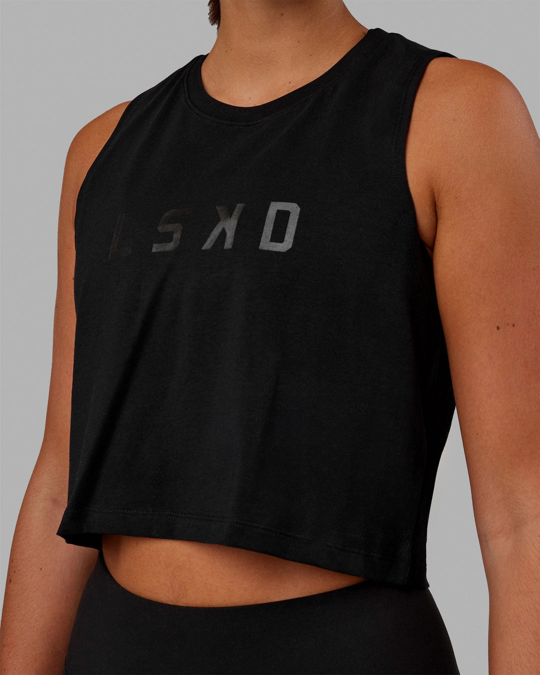Woman wearing Agile FLXCotton Tank - Black-Black - view 3
