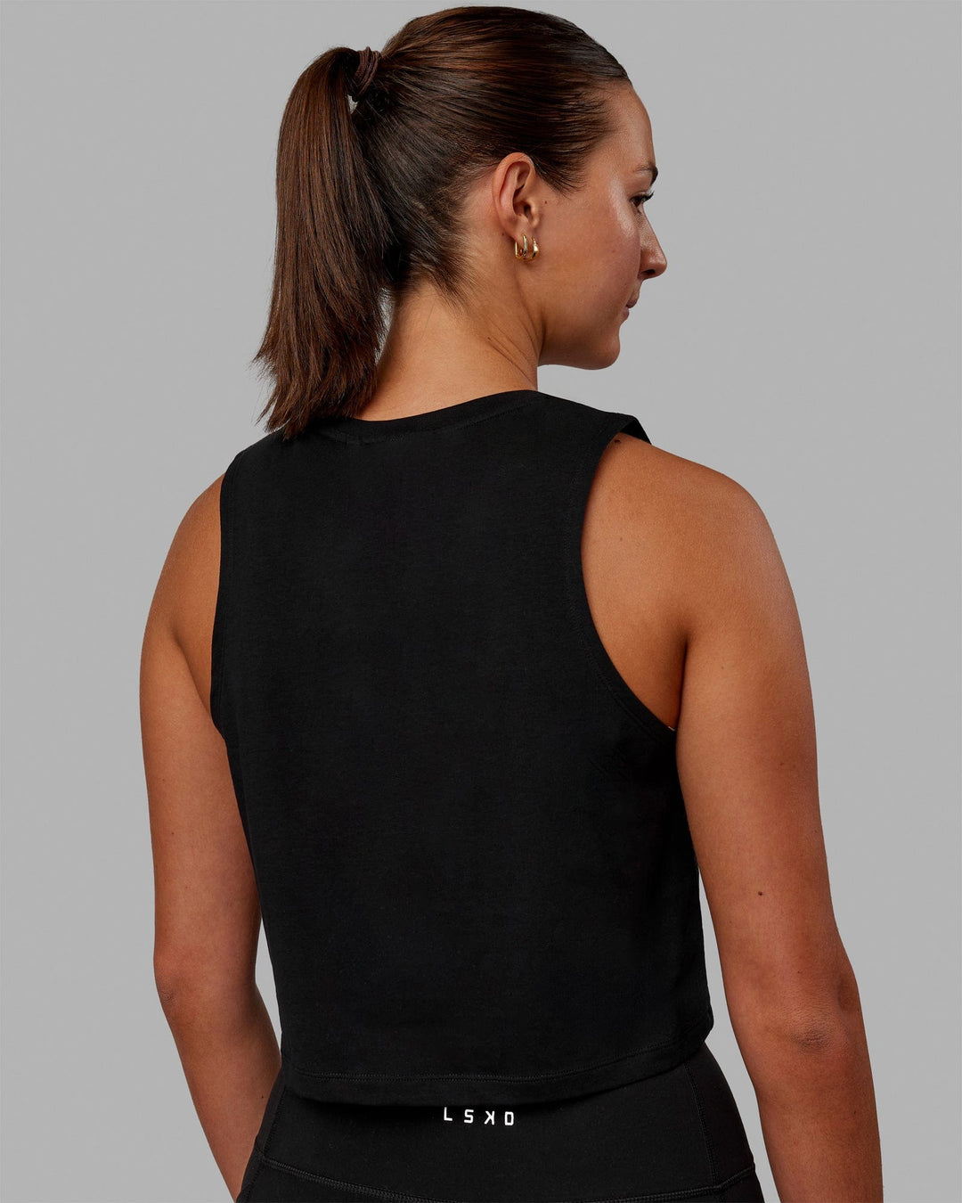 Woman wearing Agile FLXCotton Tank - Black-Black - view 4