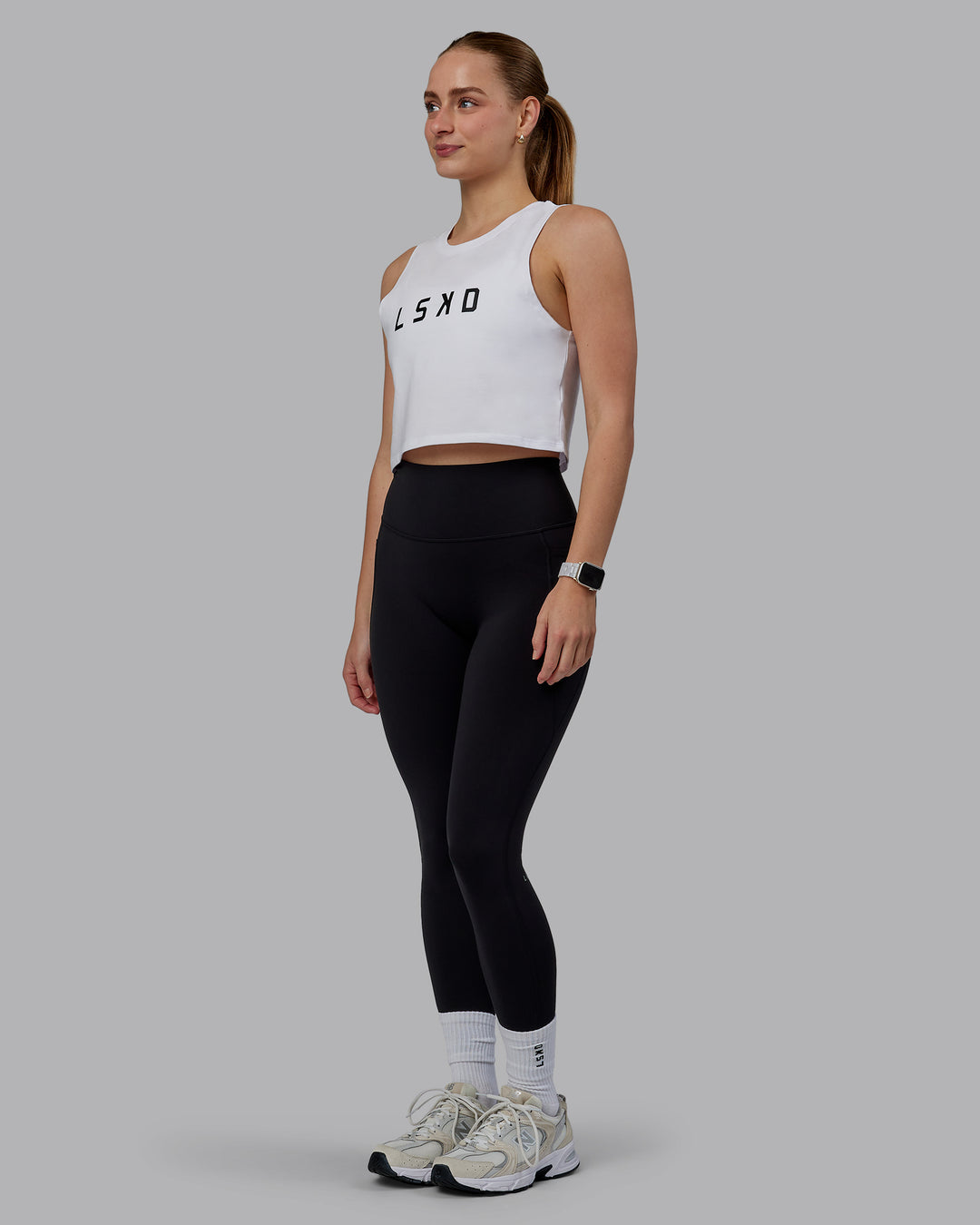 Woman wearing Agile FLXCotton Tank - White-Black - view 2