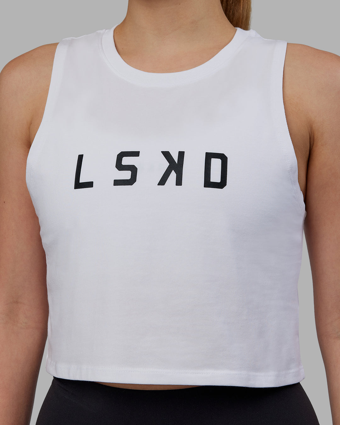 Woman wearing Agile FLXCotton Tank - White-Black - view 4