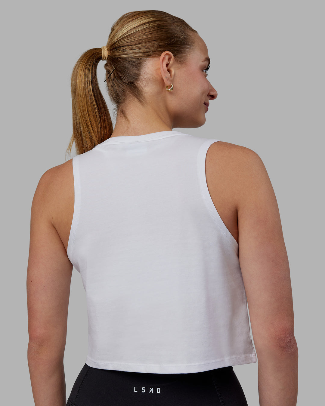 Woman wearing Agile FLXCotton Tank - White-Black - view 3
